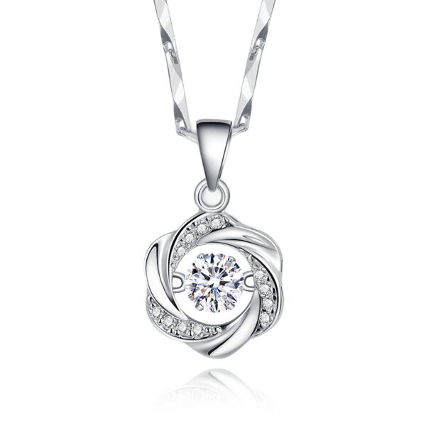 A pure silver beating heart necklace